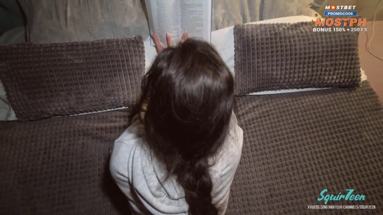 Stealthily making out with my sultry half-sister as she immerses herself in her book porn video